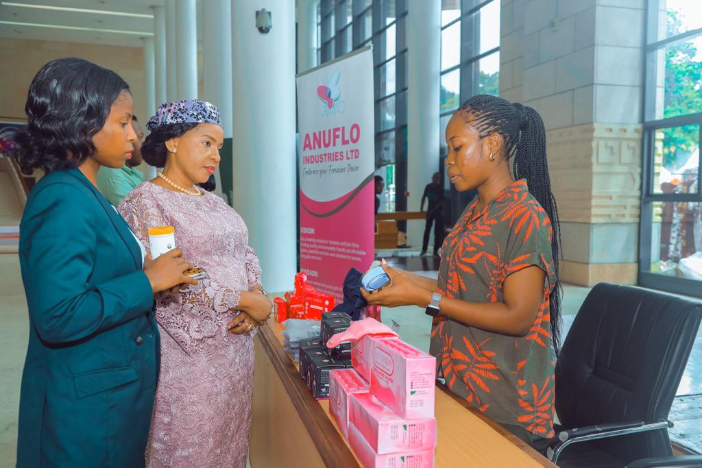 Hon Janeth Elias  Mahawanga  Dar es salaam special seats member of parliament walking through the exhibition of eco friendly products produced by different eco entrepreneurship groups from Dar es salaam.